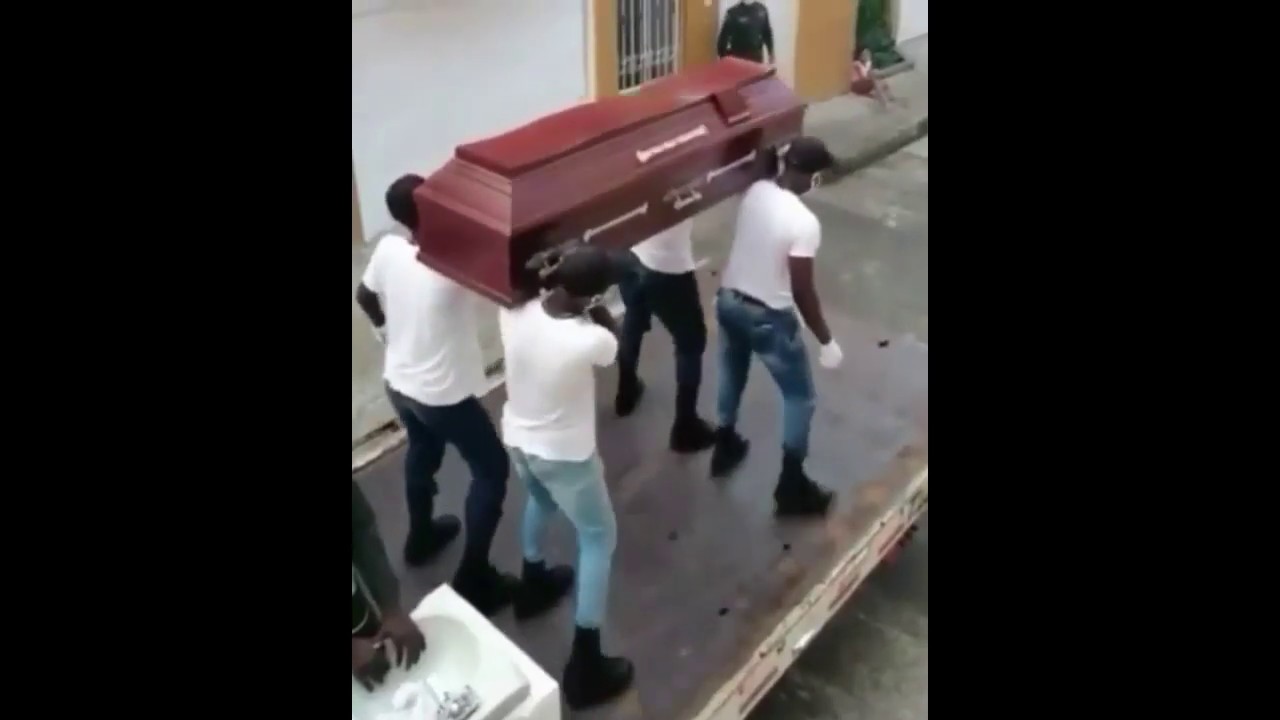 Ghanians dancing with a coffin 1