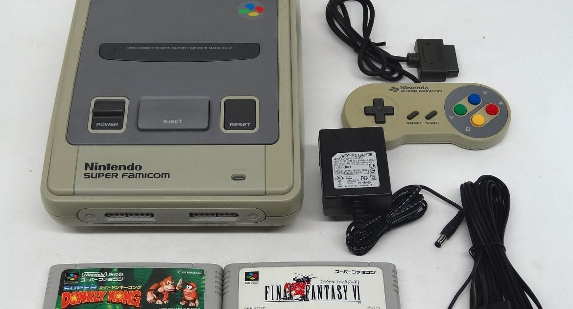 Super NES con controller e giochi