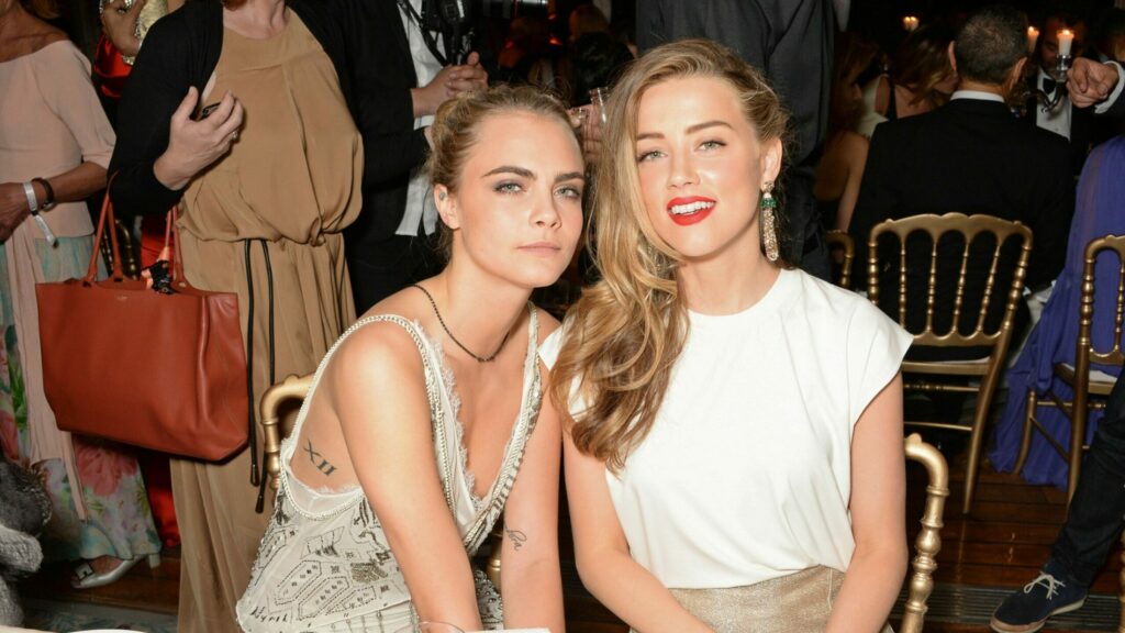 Cara Delavigne uses drugs because of Amber Heard, according to a journalist