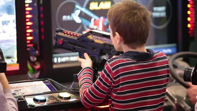 kids playing shooter video game