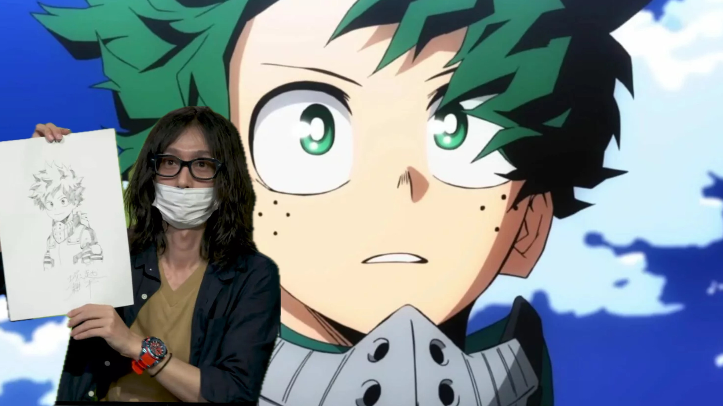 Kohei Horikoshi autore di My Hero Academia con Deku come sfondo