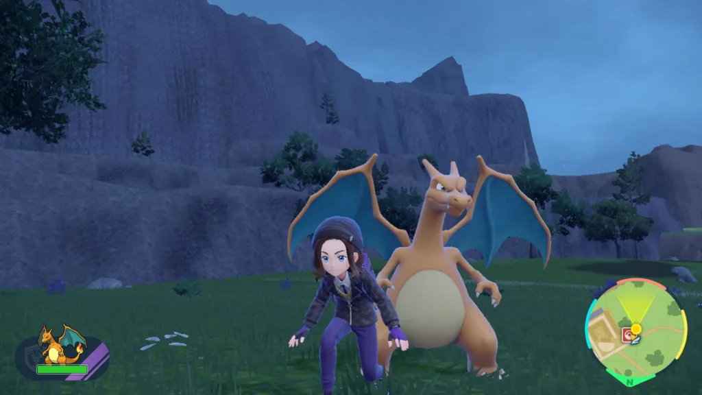 Charizard salvato dal Gamecube arriva su Scarlatto e Violetto selfie con l'allenatore