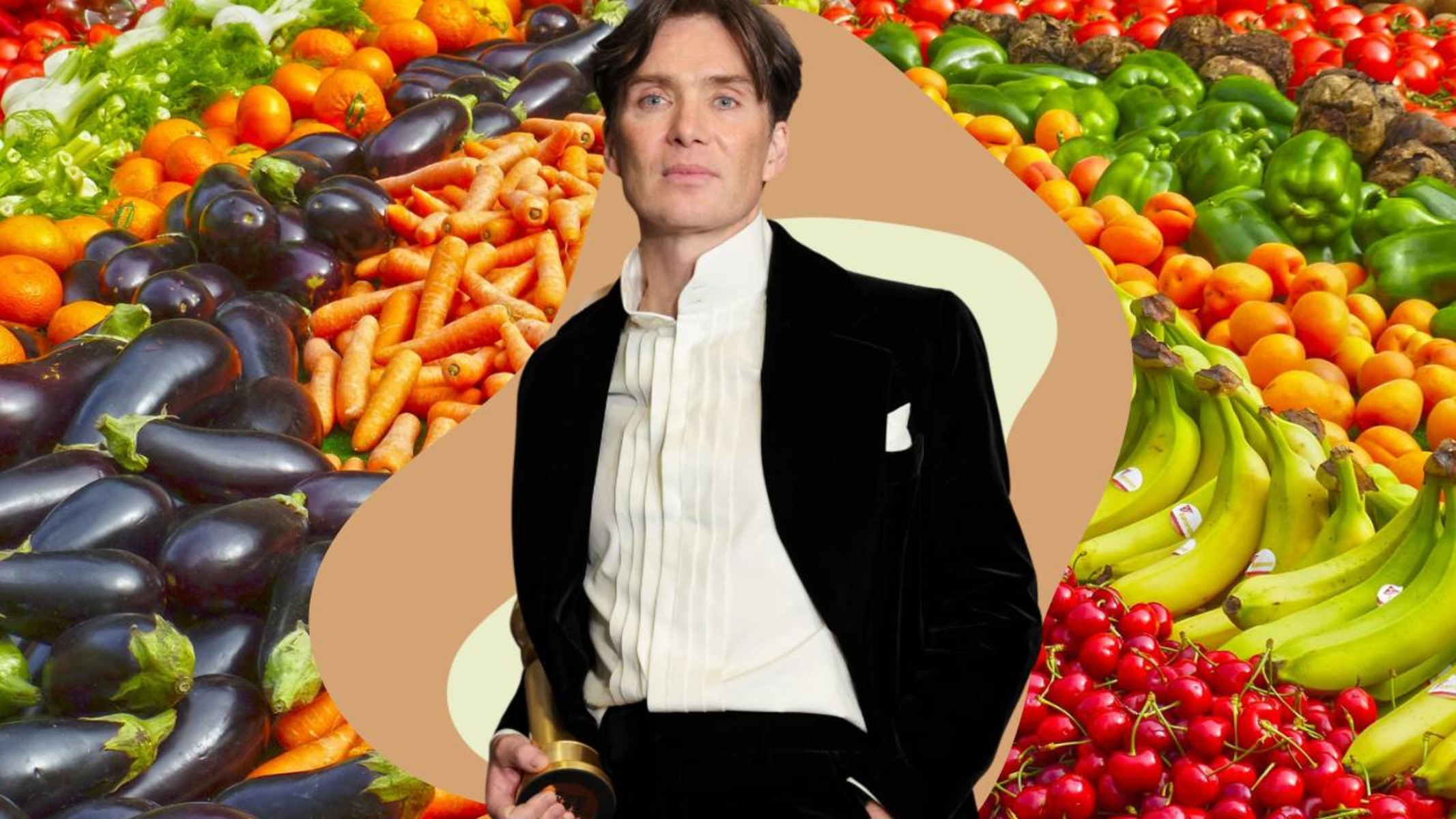 L'attore irlandese Cillian Murphy svetta su uno sfondo di frutta e verdura.